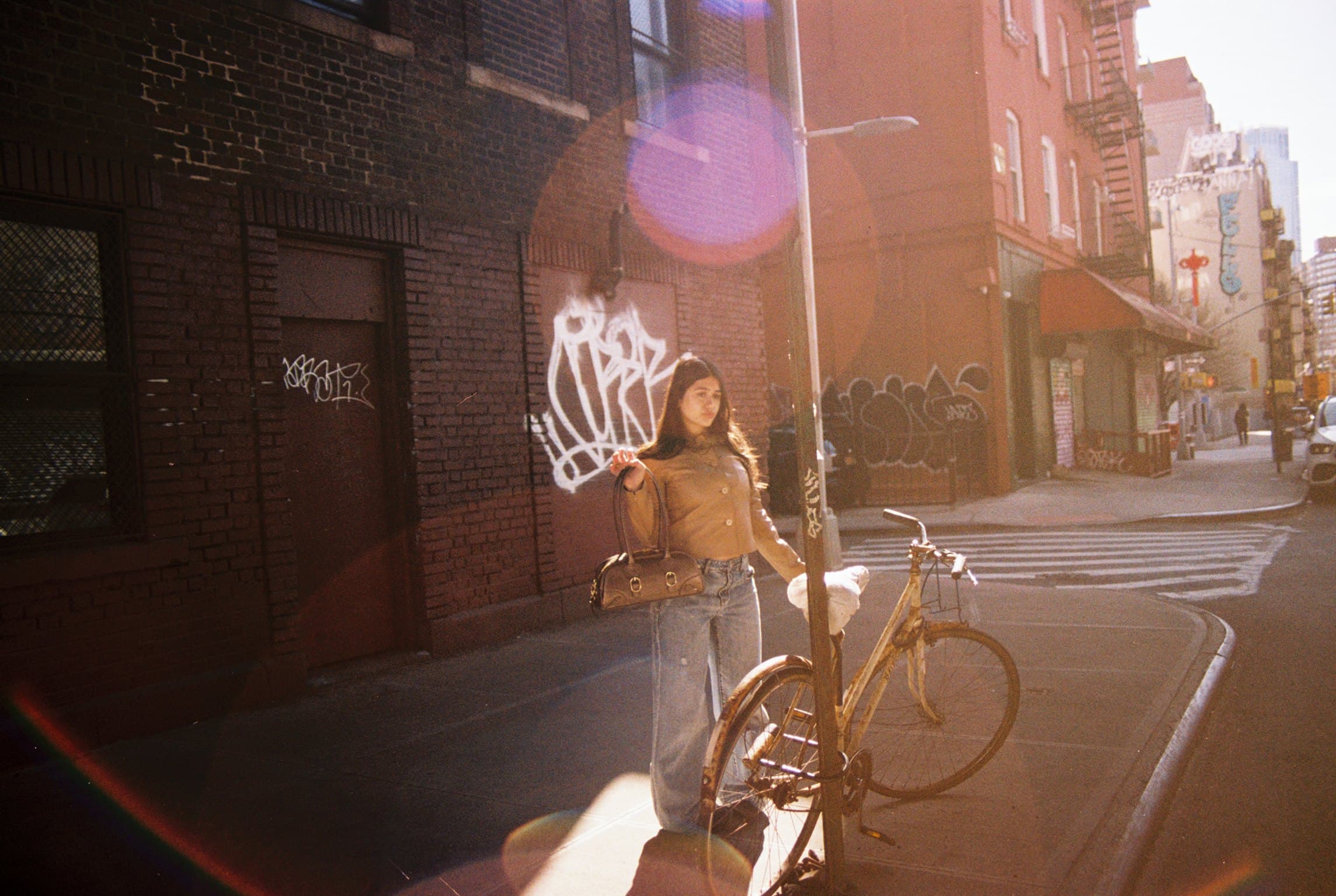 Elika Broumand, founder of Lala Blue, on a New York street corner with the Gammon Bag